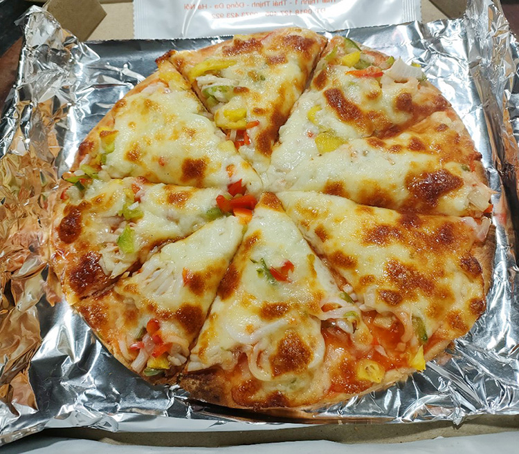 Pizza thập cẩm ăn vặt cho bà Bầu ngon tại kom9